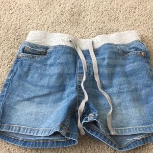 Denim shorts form justice. Adjustable waistband